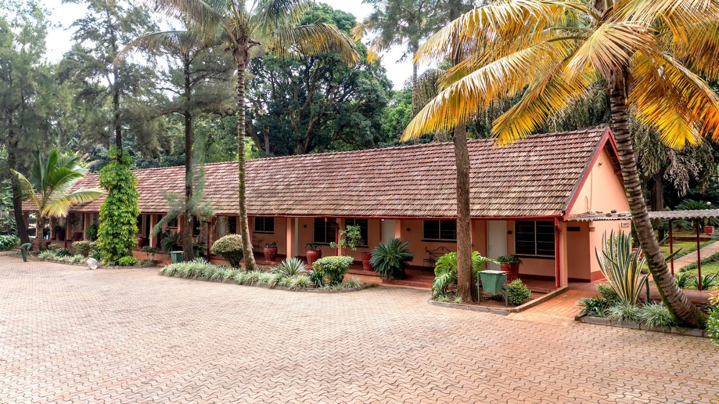 A room block at Masindi Hotel under the palms