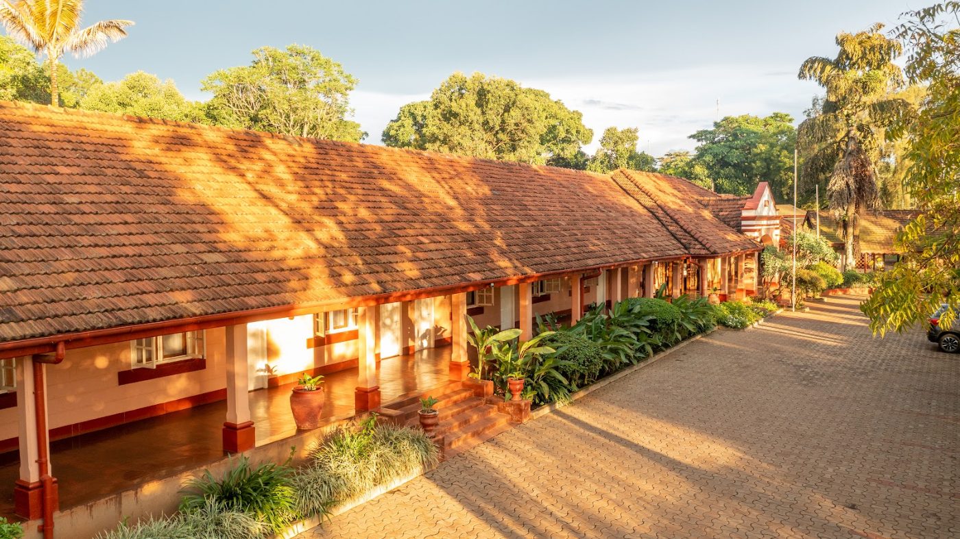 A room block at Masindi Hotel in evening light