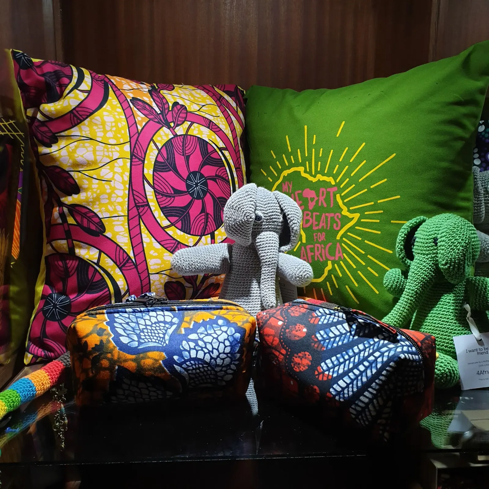 Printed cushions and crocheted animals for sale at Masindi Hotel