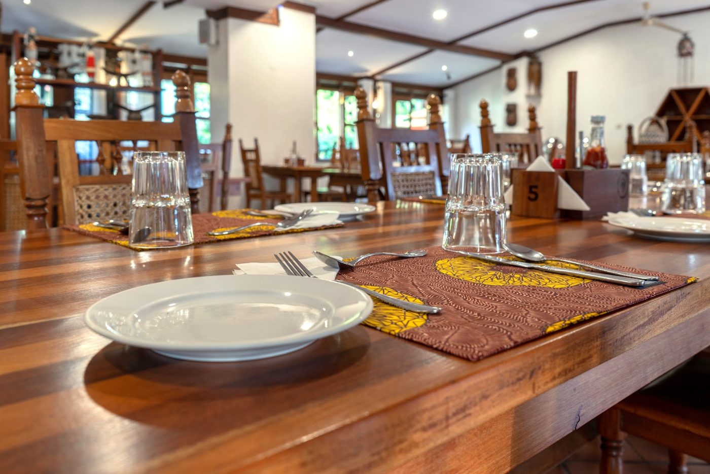 A table laid for dinner at the Kabalega Restaurant, Masindi Hotel