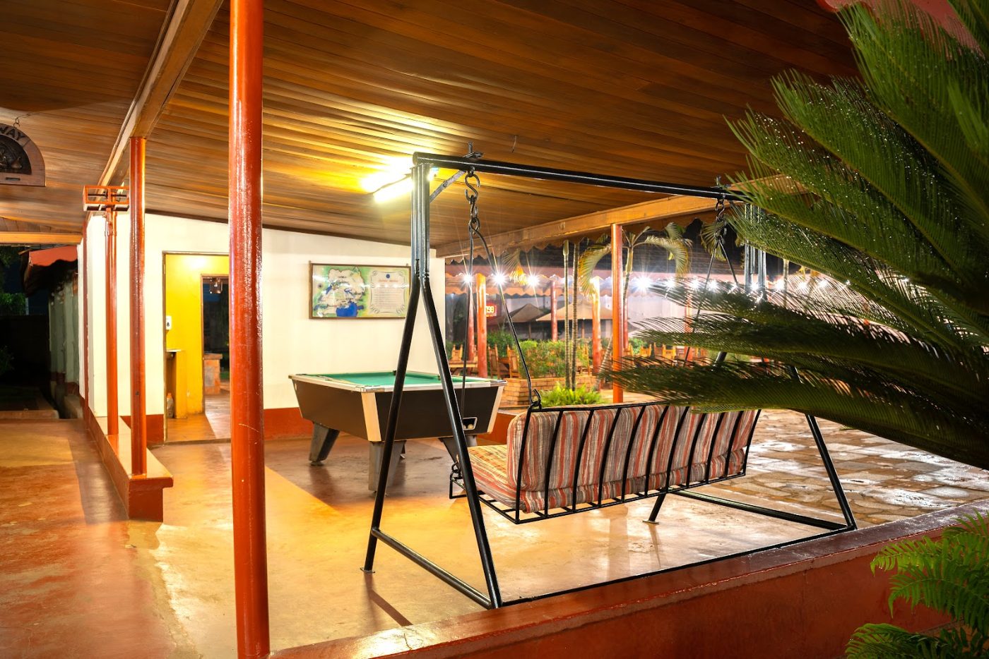 The courtyard at Masindi Hotel, an outdoor lounge and dining area between the Hemingway Bar and the dining room