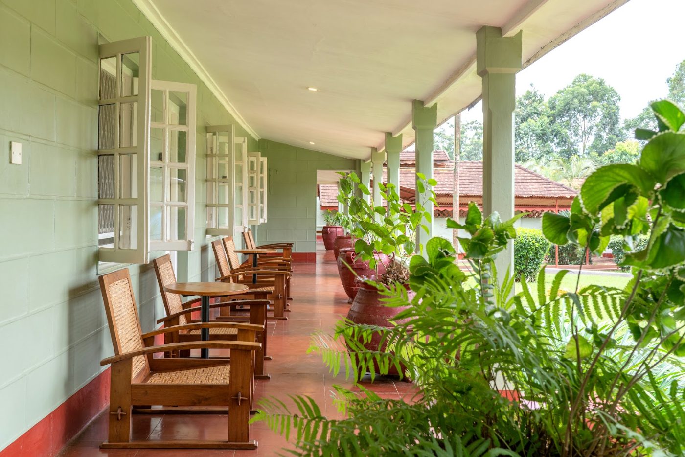 Cane chairs on a veranda at Masindi Hotel