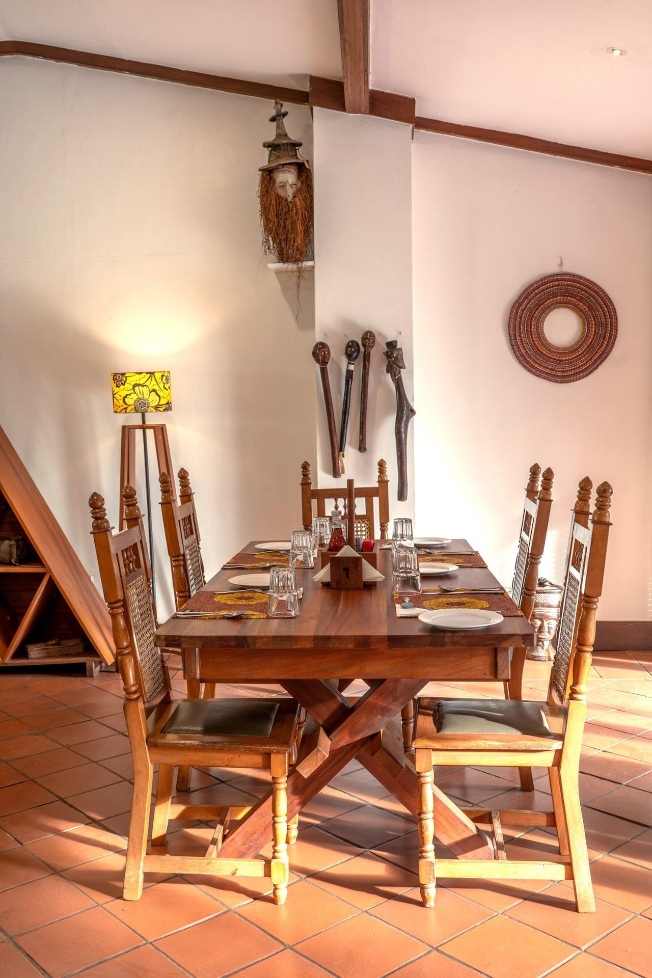 Carvings hung on the walls at Masindi Hotel