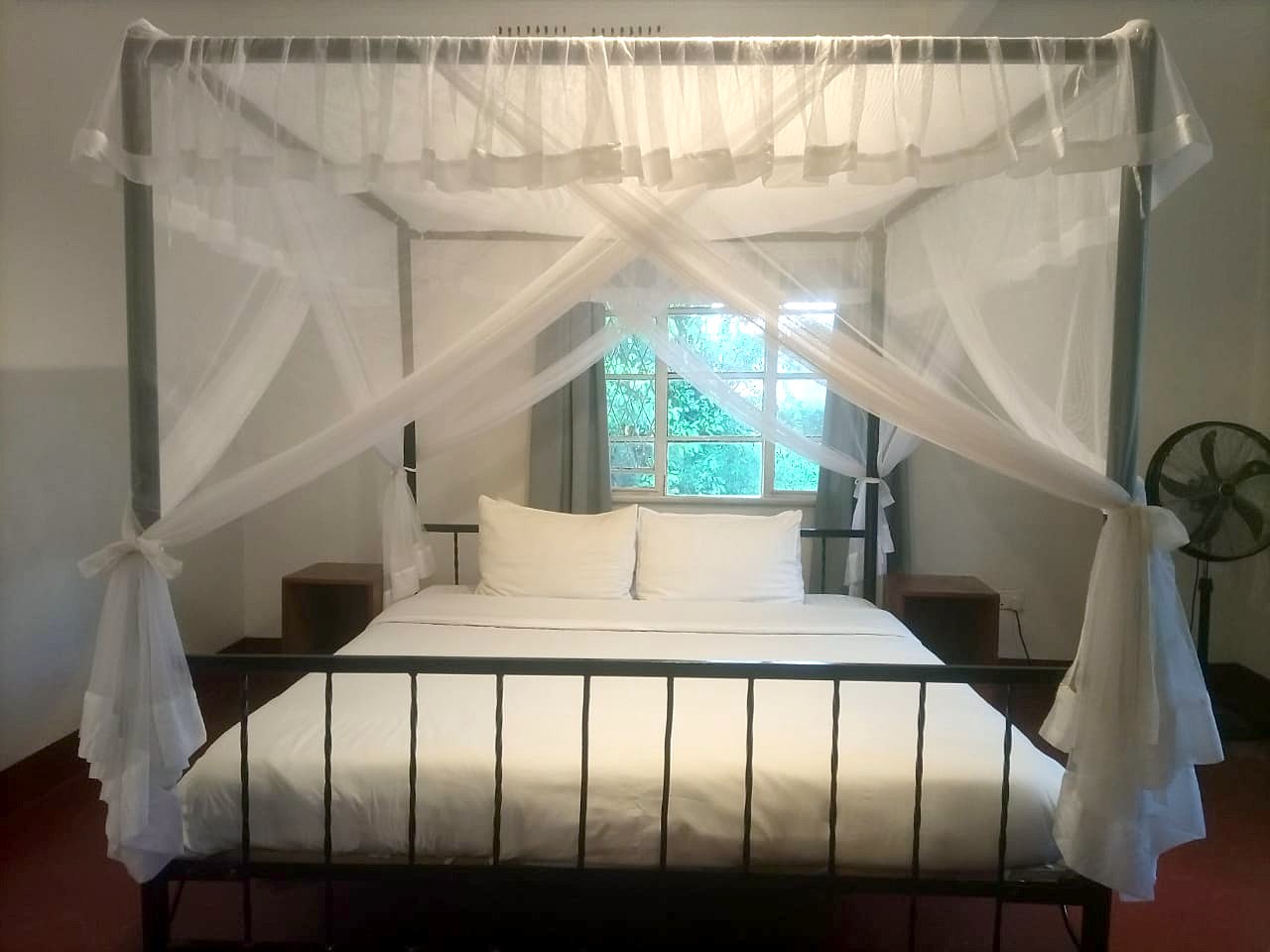 The double bedroom in the Family House at Masindi Hotel