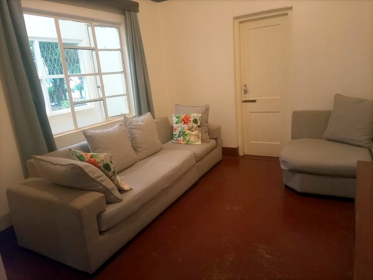 The living room of the Family House at Masindi Hotel